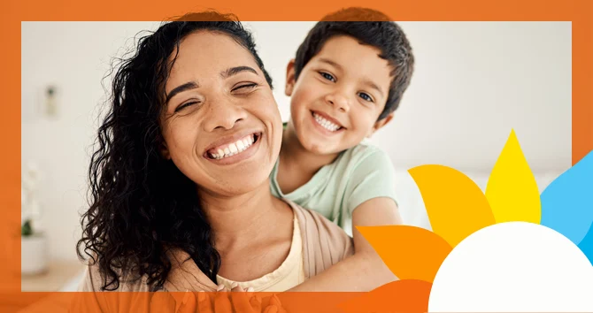a smiling mother and child